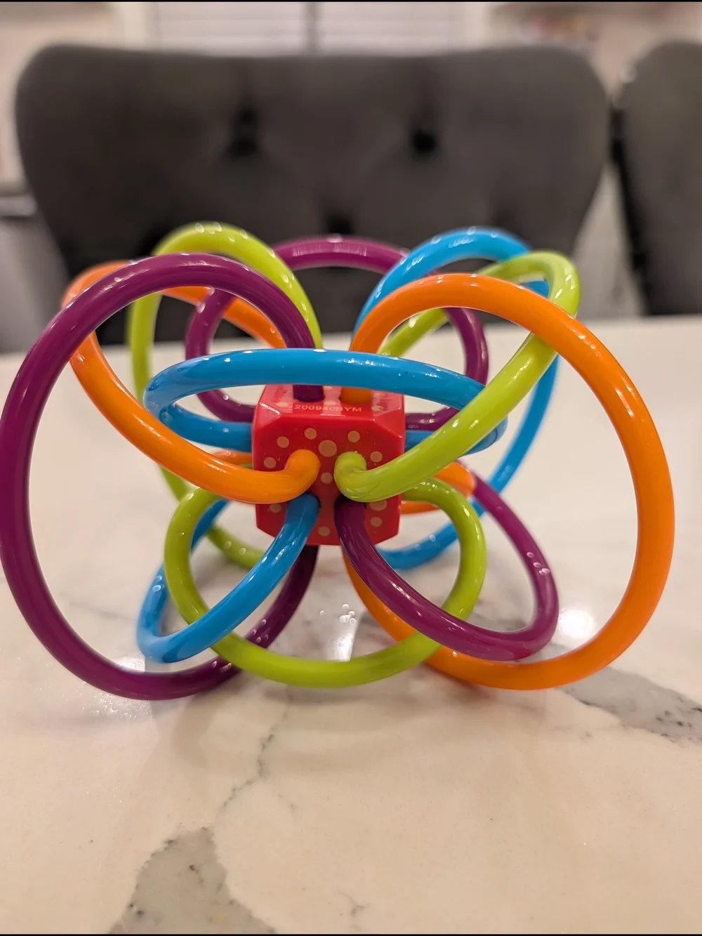 Manhattan Baby Teether & Sensory Toy - Purple, Blue, Green, Orange